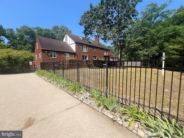 view of side of home featuring a yard