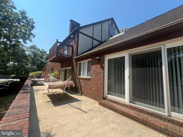 view of patio / terrace featuring a balcony