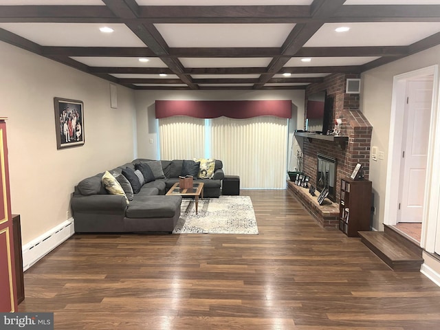 living room with a brick fireplace, a baseboard radiator, dark hardwood / wood-style flooring, and beam ceiling