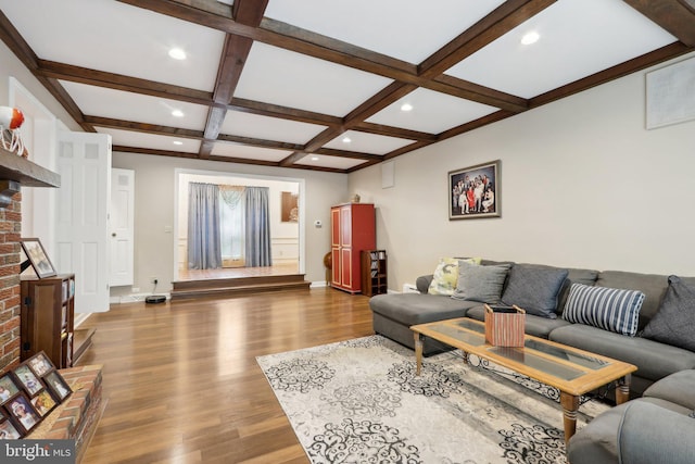 living room with coffered ceiling, beam ceiling, and hardwood / wood-style flooring