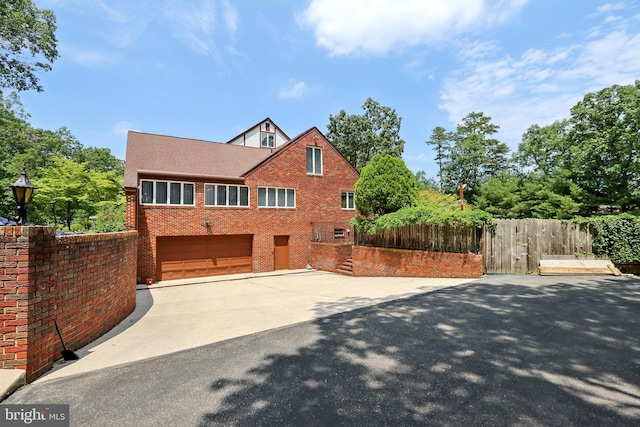 view of front of property with a garage