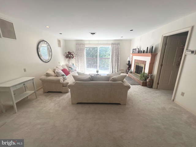 living room featuring light carpet