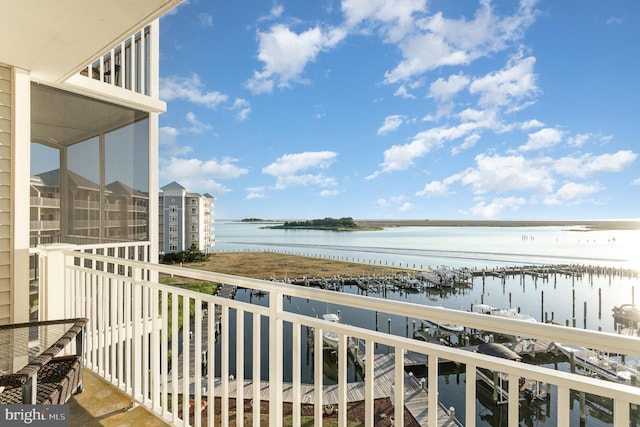 balcony featuring a water view