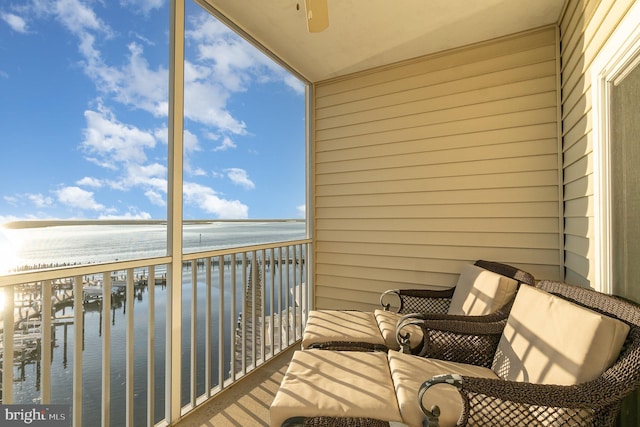 balcony featuring a water view