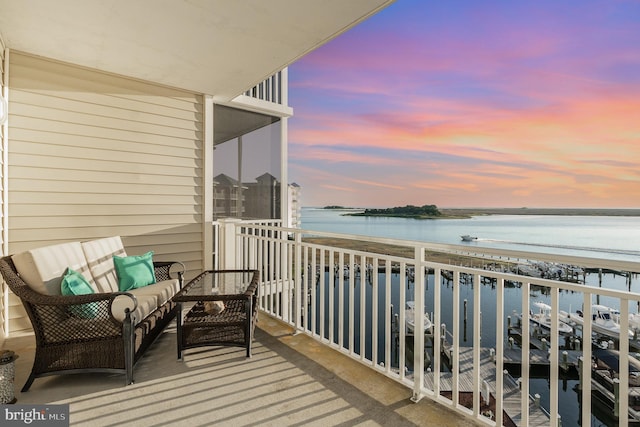 balcony at dusk with a water view