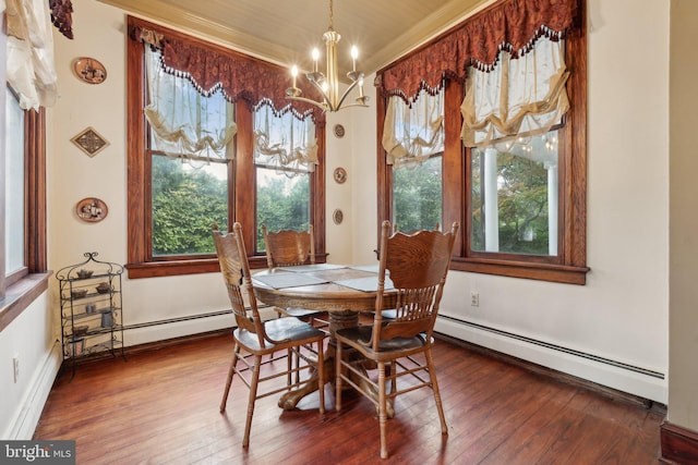 dining space featuring a healthy amount of sunlight, an inviting chandelier, a baseboard radiator, and ornamental molding