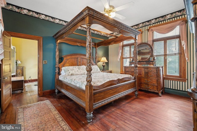 bedroom with ceiling fan and dark wood-type flooring