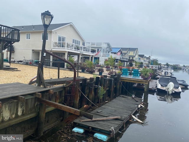 dock area with a water view