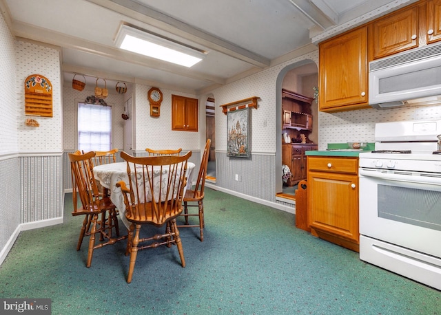 dining room with dark colored carpet