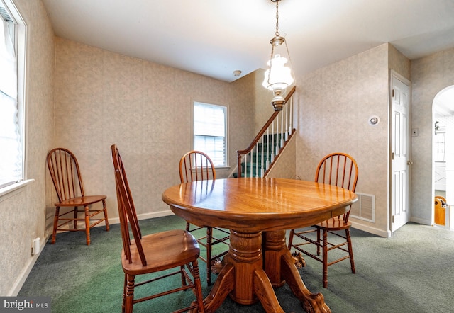 view of carpeted dining room