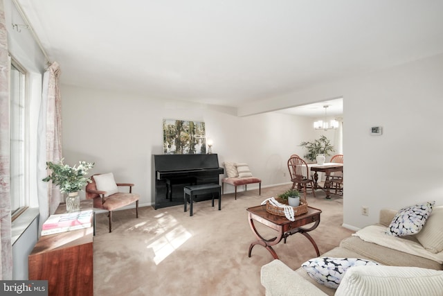 10712 Freds Oak Ct, Burke, VA 22015 - living room featuring light carpet, a chandelier, and baseboards