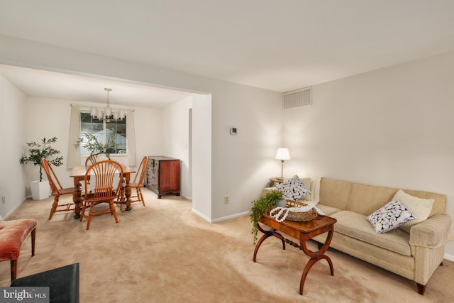 10712 Freds Oak Ct, Burke, VA 22015 - living room featuring a chandelier, light colored carpet, and baseboards