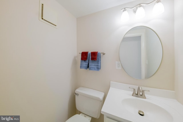 10712 Freds Oak Ct, Burke, VA 22015 - half bathroom featuring toilet and vanity
