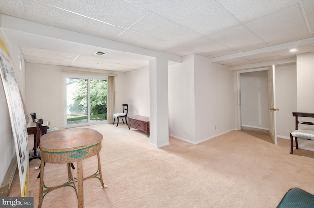 10712 Freds Oak Ct, Burke, VA 22015 - living area featuring a paneled ceiling, light colored carpet, and baseboards