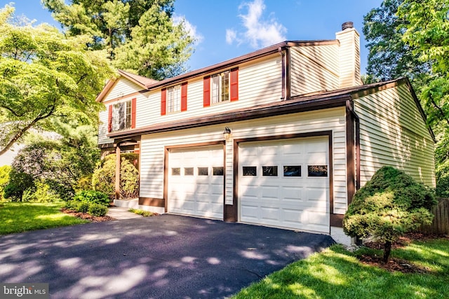 10712 Freds Oak Ct, Burke, VA 22015 - traditional-style home with a chimney, a garage, and driveway
