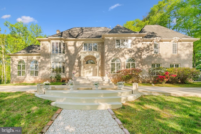 view of front of home with a front lawn