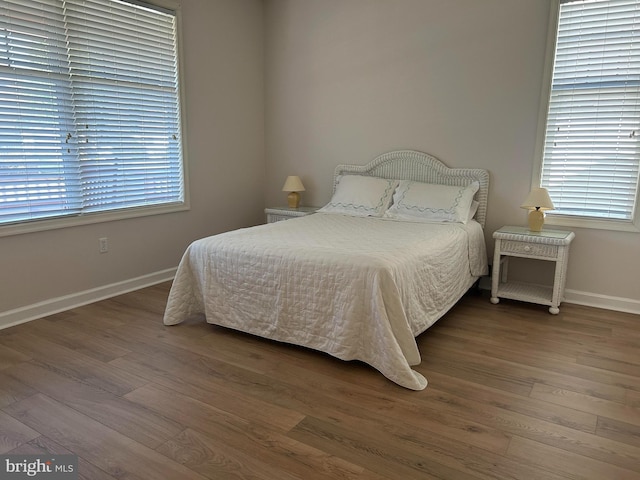 bedroom featuring wood-type flooring