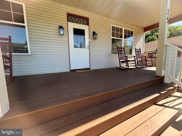 wooden deck featuring a porch