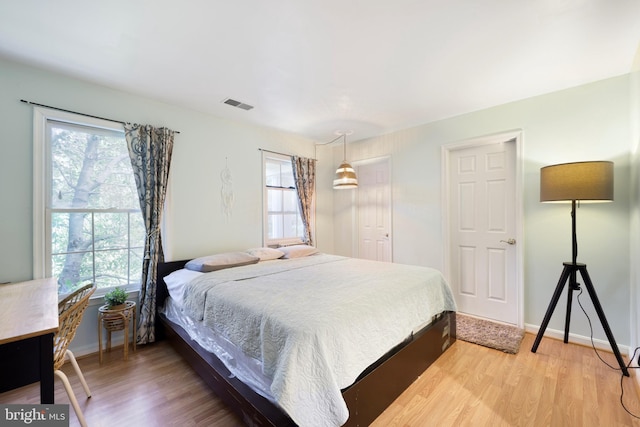 bedroom featuring hardwood / wood-style flooring