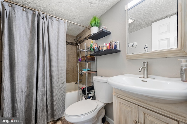 full bathroom with a textured ceiling, toilet, vanity, and shower / tub combo with curtain