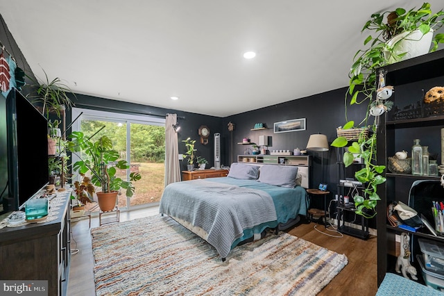 bedroom featuring hardwood / wood-style floors