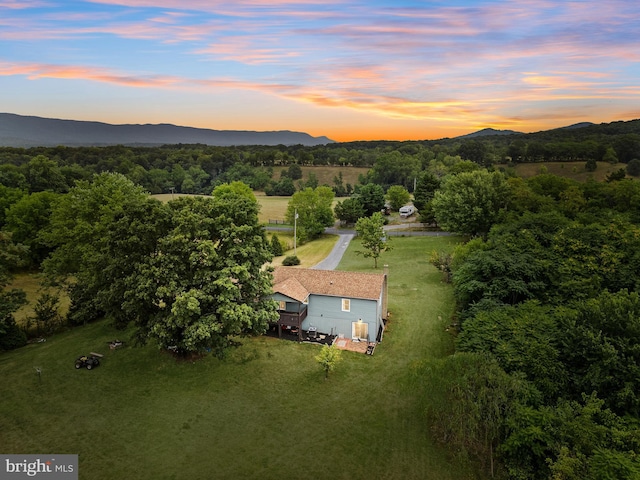 aerial view at dusk with a mountain view