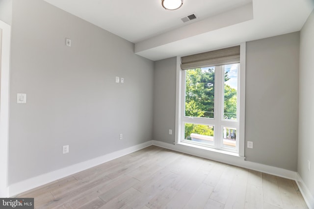 empty room featuring light hardwood / wood-style floors