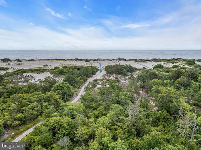 aerial view featuring a view of the beach and a water view