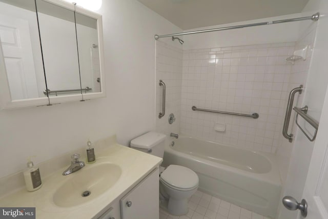 full bathroom with tiled shower / bath, vanity, toilet, and tile patterned flooring