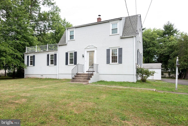 view of front of property with a front lawn