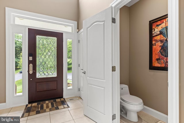 entrance foyer featuring light tile patterned floors