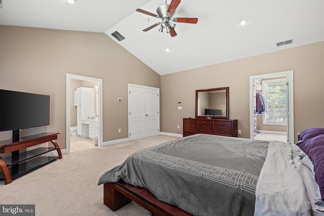 carpeted bedroom featuring connected bathroom, ceiling fan, and high vaulted ceiling