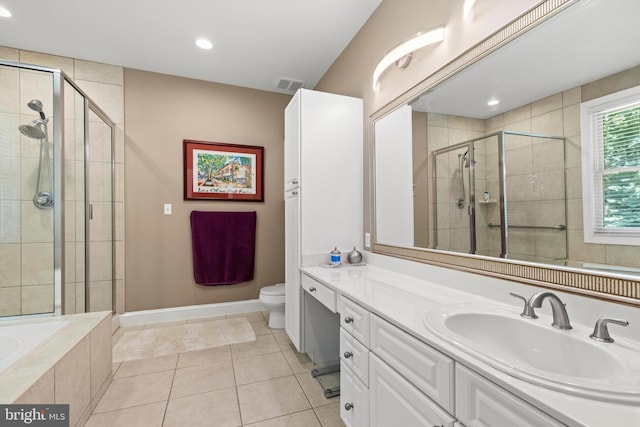 full bathroom with toilet, vanity, tile patterned floors, and plus walk in shower