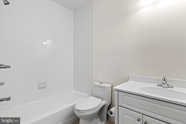 full bathroom with vanity, toilet, and tiled shower / bath