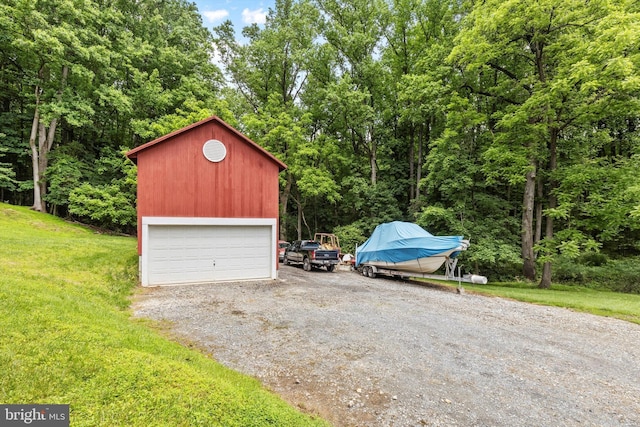 garage with a yard