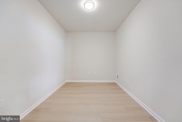 spare room with light hardwood / wood-style flooring