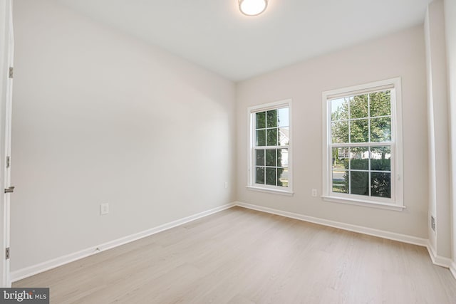 empty room featuring light hardwood / wood-style floors