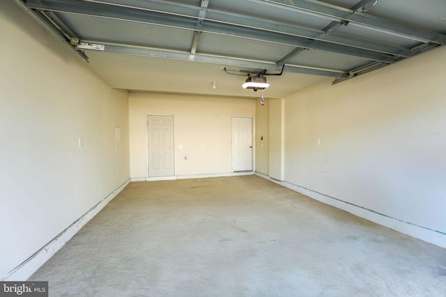 garage featuring a garage door opener