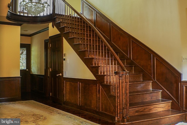 stairway with crown molding