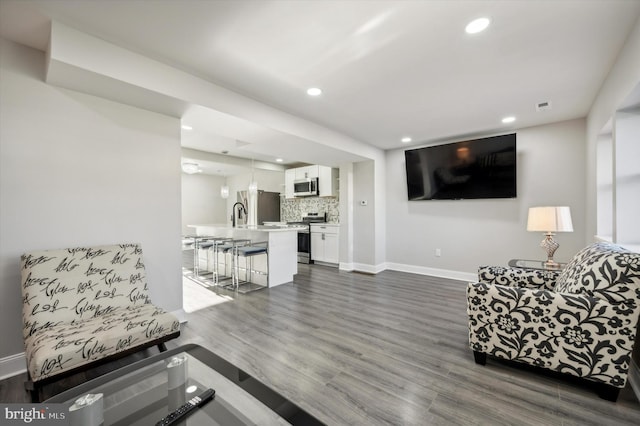 living room featuring dark hardwood / wood-style floors