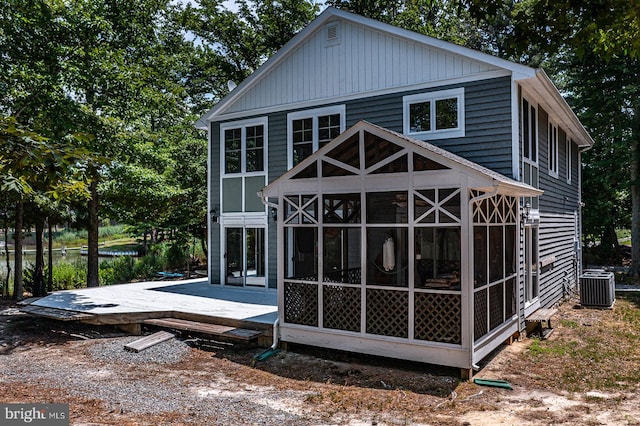 back of property with central AC unit