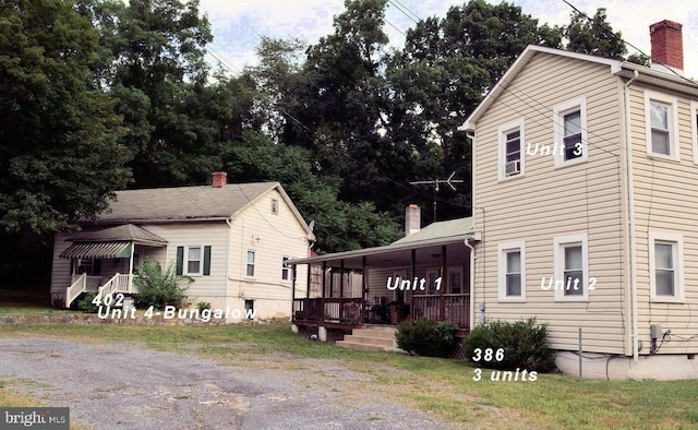 view of home's exterior with a porch