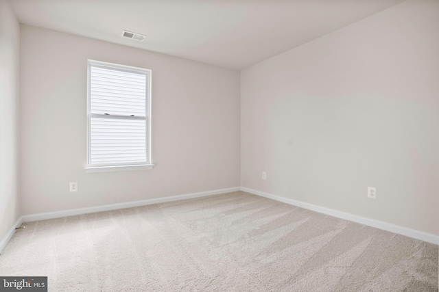 spare room with carpet flooring