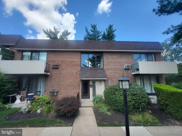 view of property with a balcony