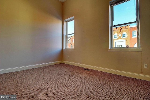 view of carpeted spare room