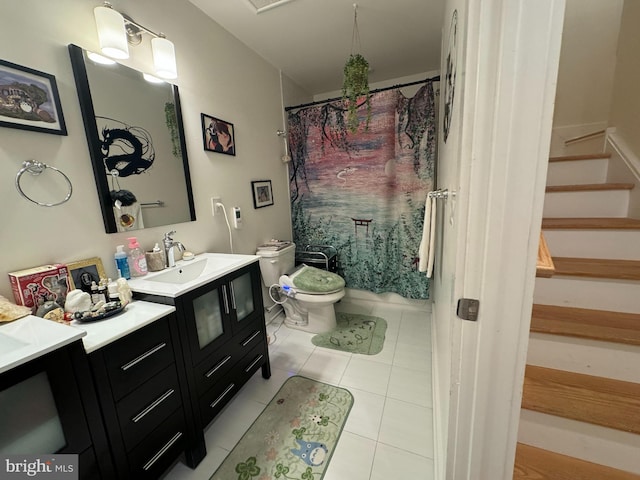 bathroom with a shower with curtain, tile patterned flooring, toilet, and vanity