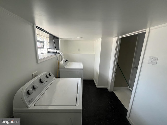 laundry room featuring washing machine and dryer