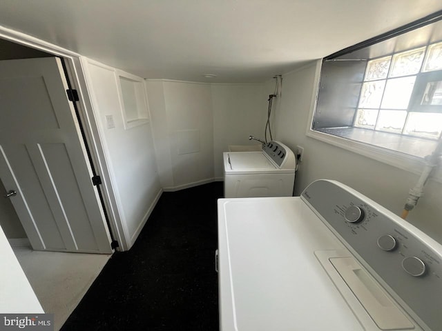 laundry room with washer and dryer