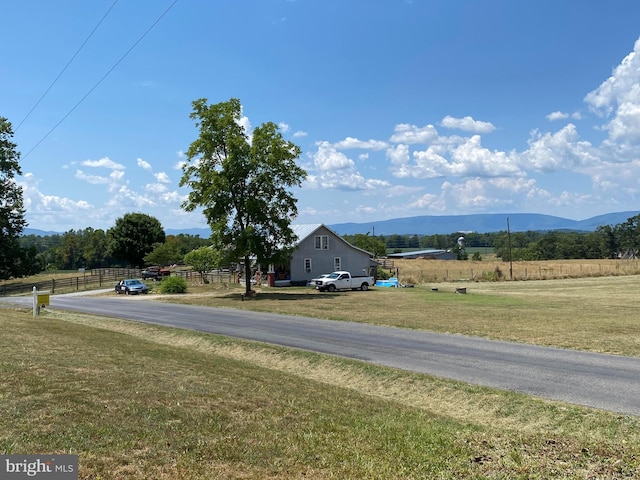 view of street featuring a mountain view and a rural view