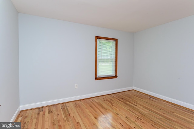 empty room featuring hardwood / wood-style floors